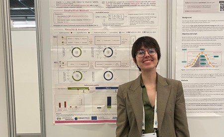 Photo of BRGM colleague in front of a poster